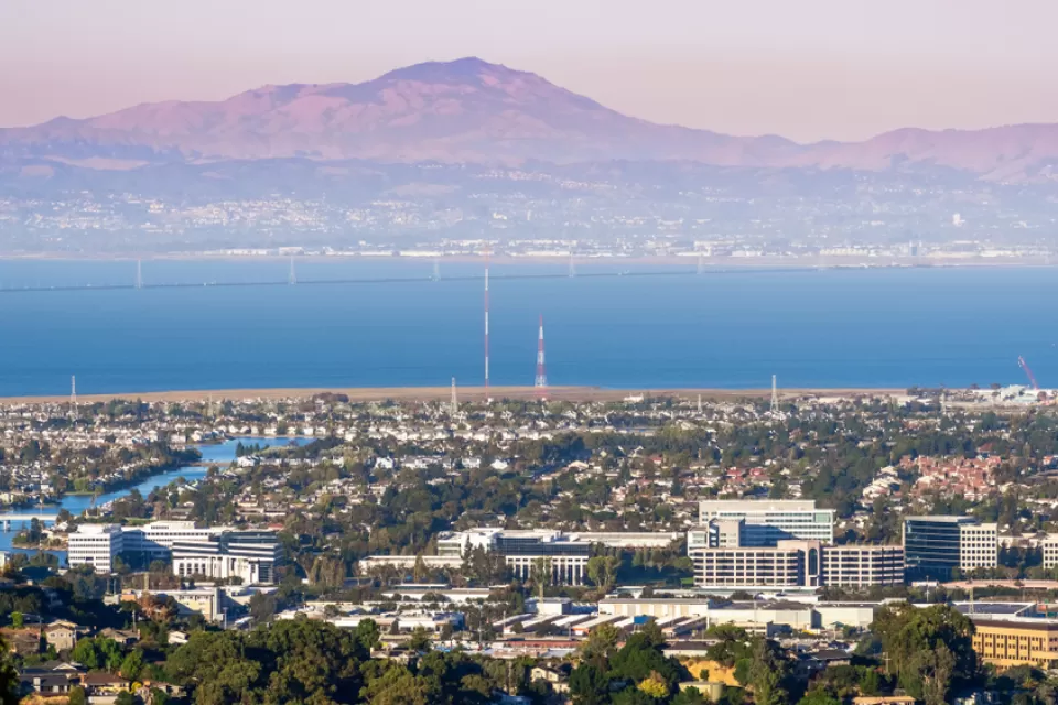 The San Francisco Bay Area is visible from San Carlos, across the bay to the East Bay. Mount Diablo looms in the background.